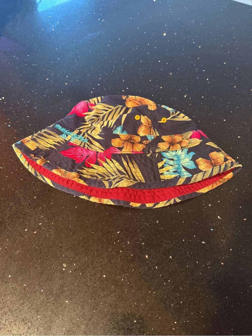 Tropical Floral Mitchell & Ness Cleveland Cavaliers NBA Bucket Hat with Red Trim